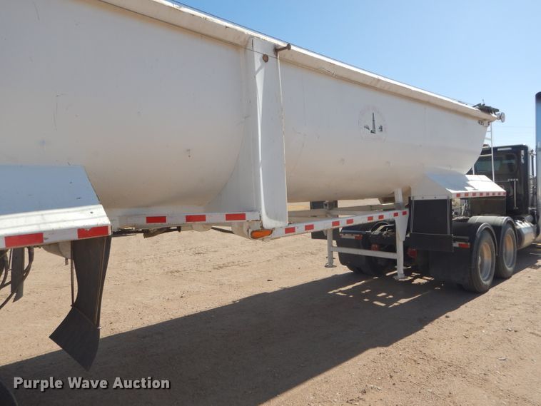 image for item DG0287 1999 Western Construction STR32 end dump trailer