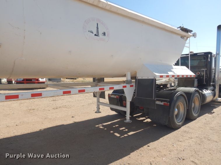 image for item DG0287 1999 Western Construction STR32 end dump trailer