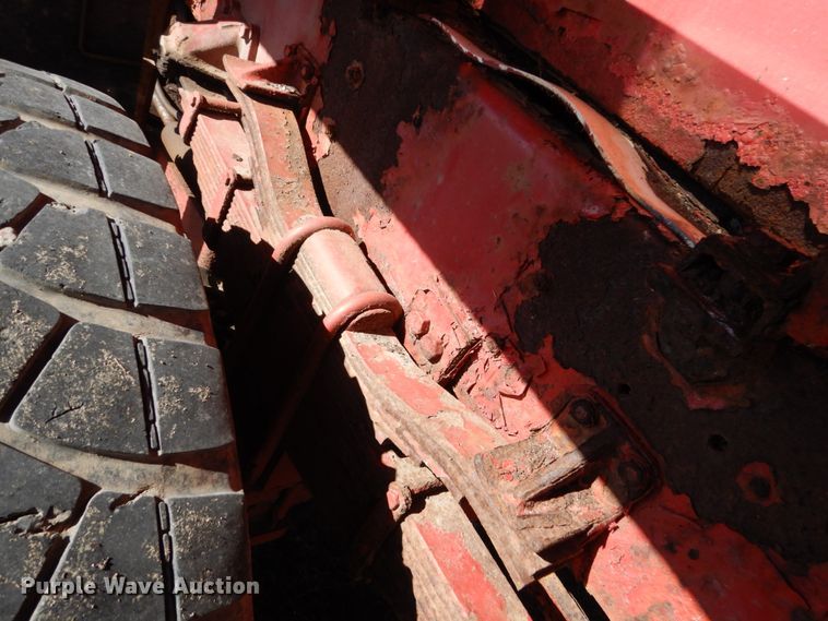 image for item EC9063 1988 Oshkosh P-256-SP spreader truck