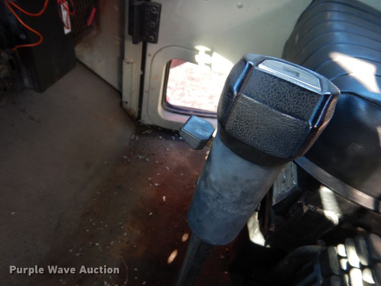 image for item EC9063 1988 Oshkosh P-256-SP spreader truck