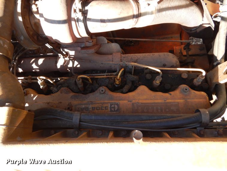 image for item EC9065 1985 Oshkosh P-2526-1 spreader truck