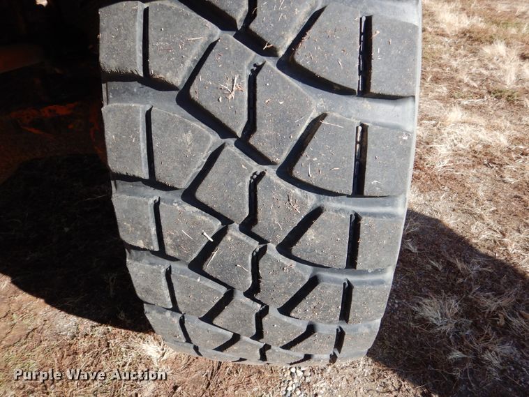 image for item EC9065 1985 Oshkosh P-2526-1 spreader truck