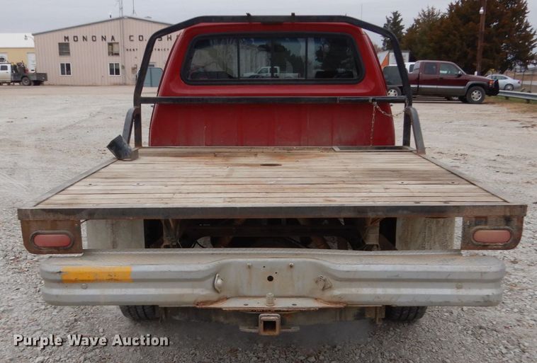 image for item EC9124 1991 Dodge Ram 150 flatbed pickup truck