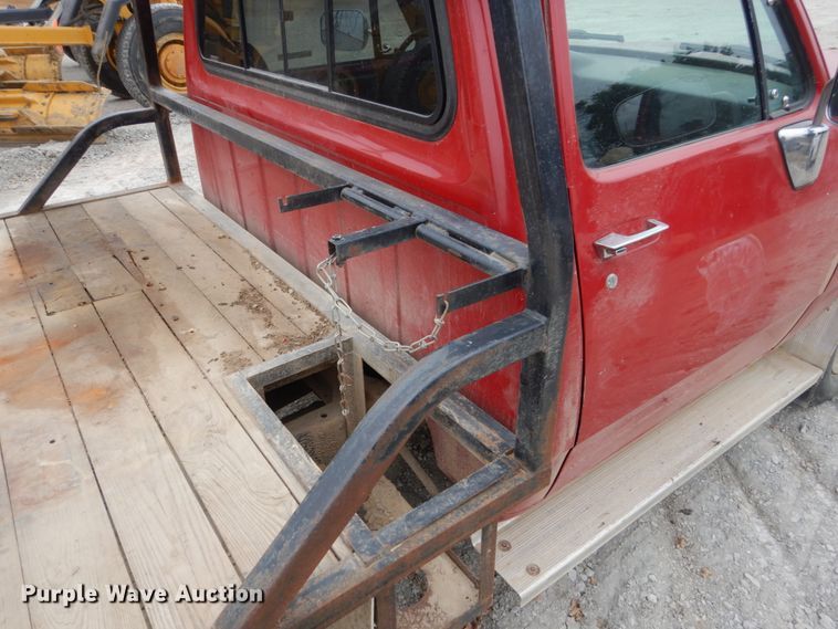 image for item EC9124 1991 Dodge Ram 150 flatbed pickup truck