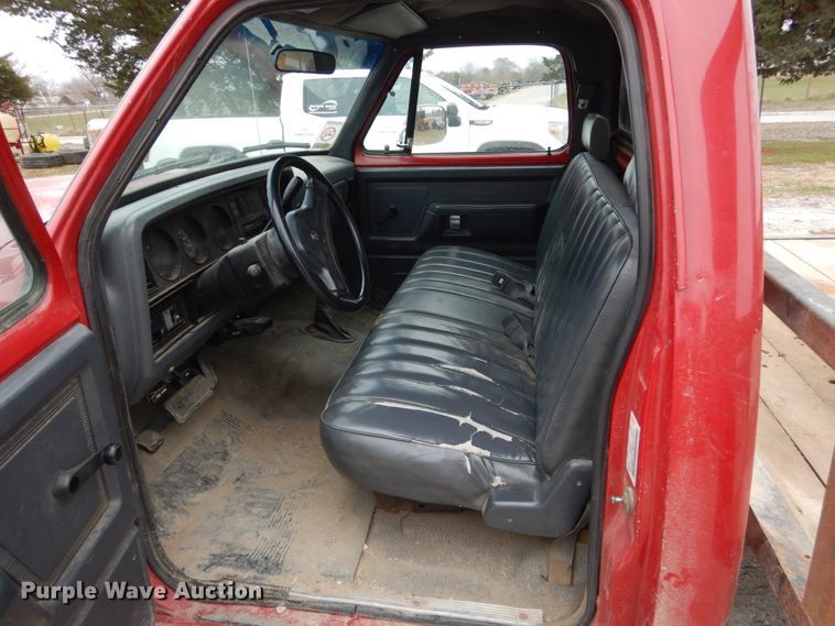 image for item EC9124 1991 Dodge Ram 150 flatbed pickup truck