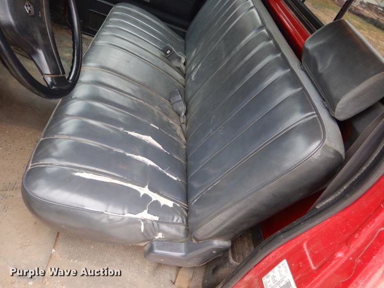 image for item EC9124 1991 Dodge Ram 150 flatbed pickup truck