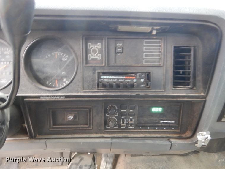 image for item EC9124 1991 Dodge Ram 150 flatbed pickup truck