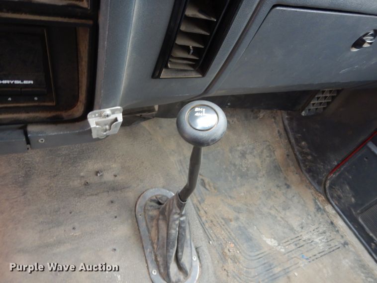 image for item EC9124 1991 Dodge Ram 150 flatbed pickup truck