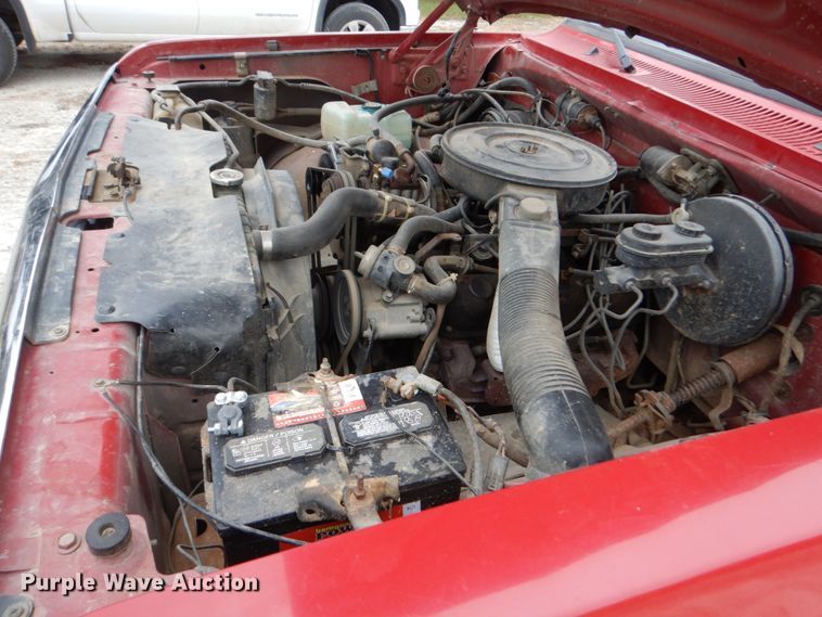 image for item EC9124 1991 Dodge Ram 150 flatbed pickup truck