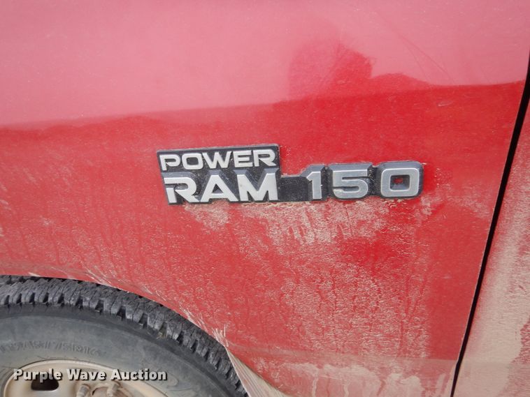 image for item EC9124 1991 Dodge Ram 150 flatbed pickup truck