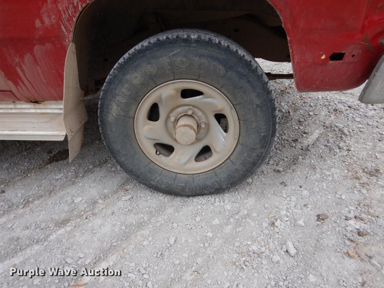 image for item EC9124 1991 Dodge Ram 150 flatbed pickup truck