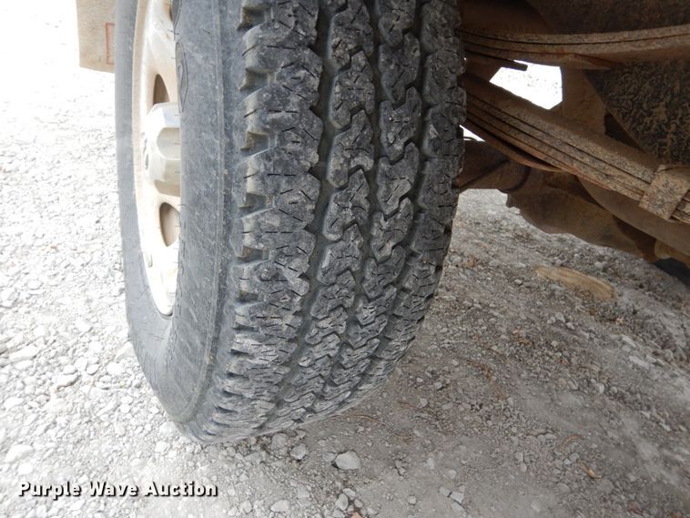 image for item EC9124 1991 Dodge Ram 150 flatbed pickup truck