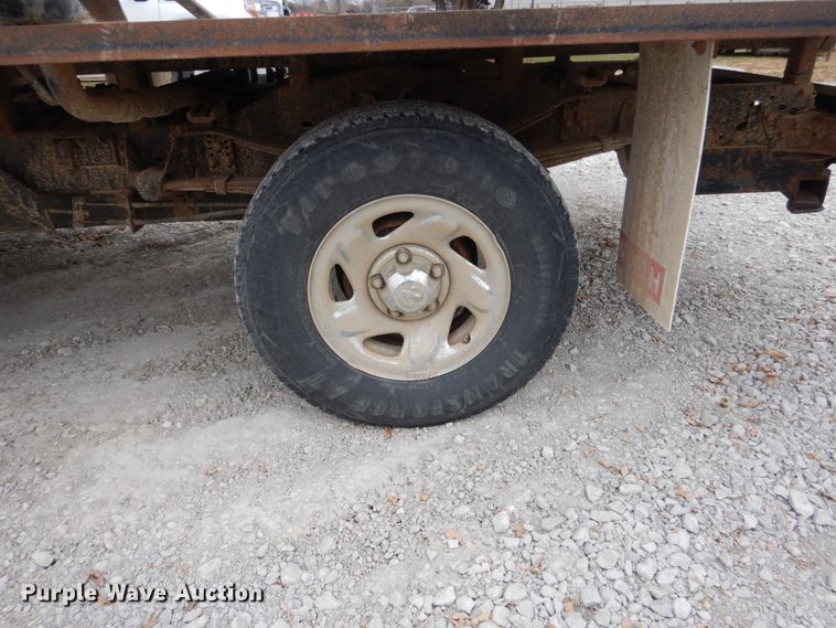 image for item EC9124 1991 Dodge Ram 150 flatbed pickup truck