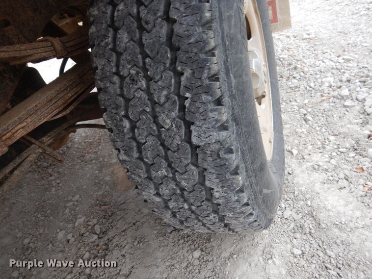 image for item EC9124 1991 Dodge Ram 150 flatbed pickup truck