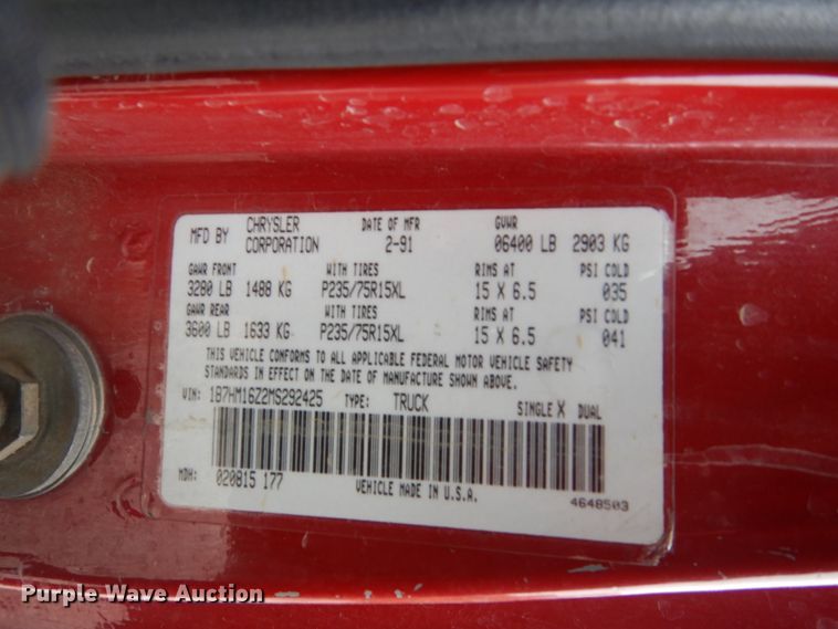 image for item EC9124 1991 Dodge Ram 150 flatbed pickup truck