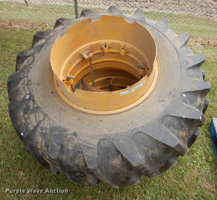 image for item EC9135 (2) 16.9-24 tires and wheels