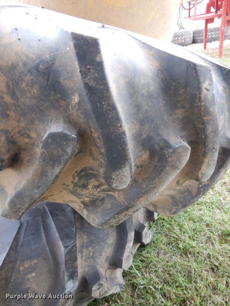 image for item EC9135 (2) 16.9-24 tires and wheels