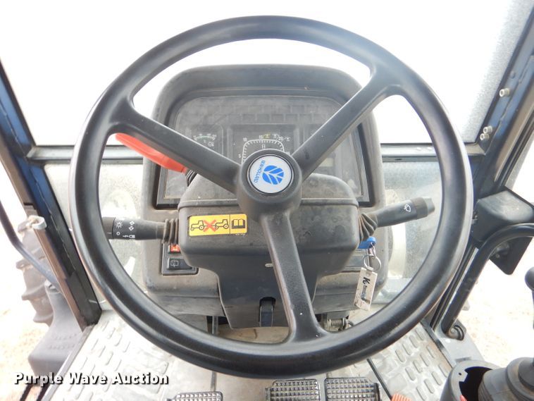 image for item FJ9878 2003 New Holland TM130 MFWD tractor