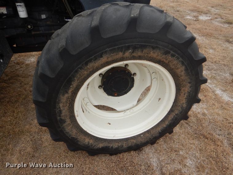 image for item FJ9878 2003 New Holland TM130 MFWD tractor