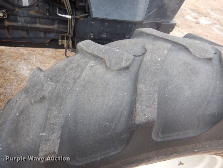 image for item FJ9878 2003 New Holland TM130 MFWD tractor