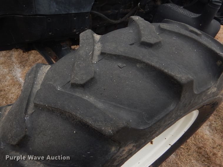 image for item FJ9878 2003 New Holland TM130 MFWD tractor