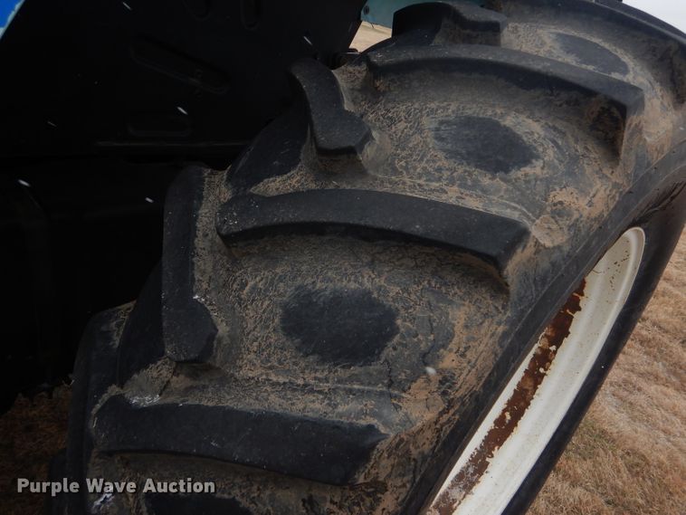 image for item FJ9878 2003 New Holland TM130 MFWD tractor