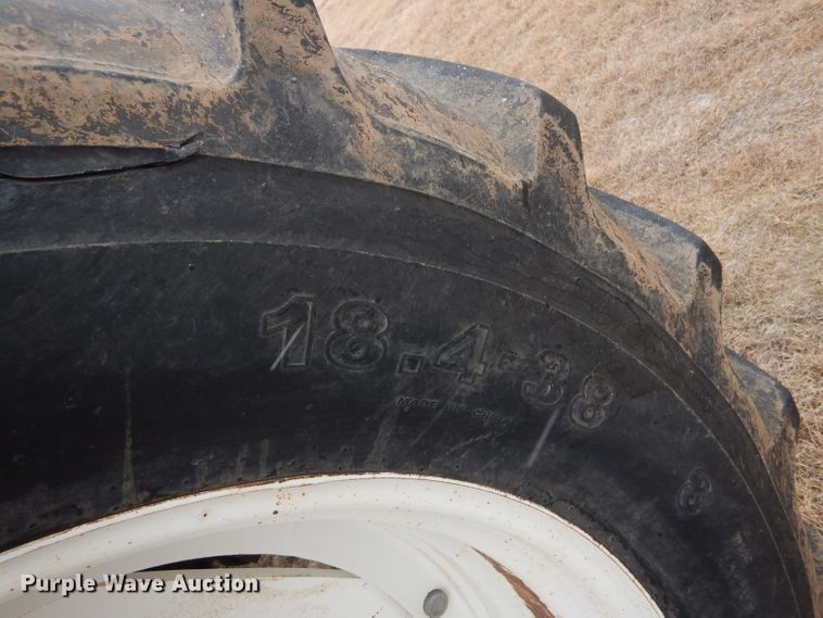 image for item FJ9878 2003 New Holland TM130 MFWD tractor