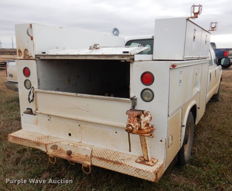 image for item GJ9034 2004 Ford F350 Super Duty Crew Cab utility bed pickup truck