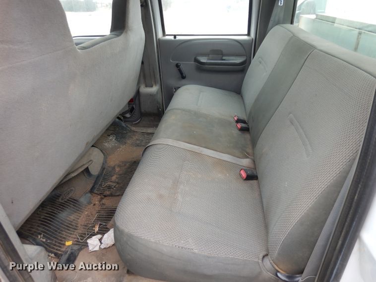 image for item GJ9034 2004 Ford F350 Super Duty Crew Cab utility bed pickup truck