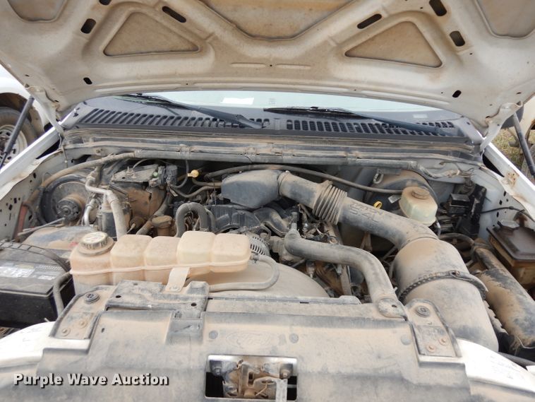 image for item GJ9034 2004 Ford F350 Super Duty Crew Cab utility bed pickup truck