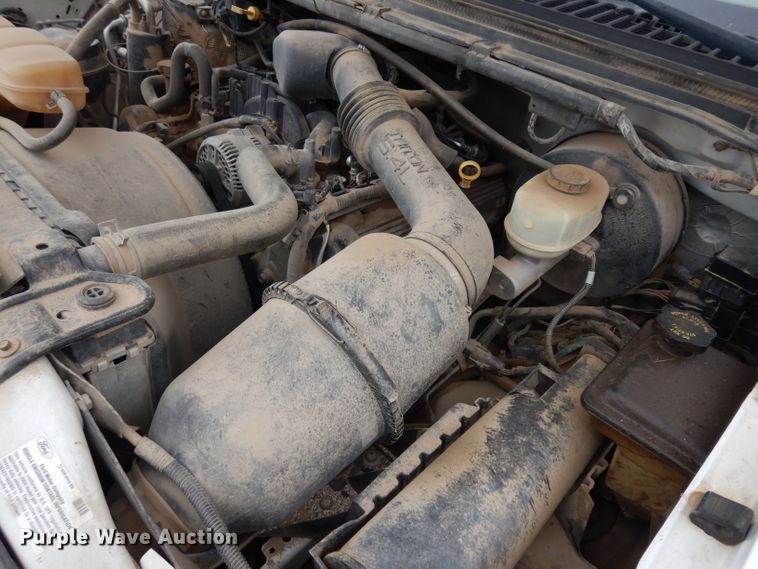 image for item GJ9034 2004 Ford F350 Super Duty Crew Cab utility bed pickup truck