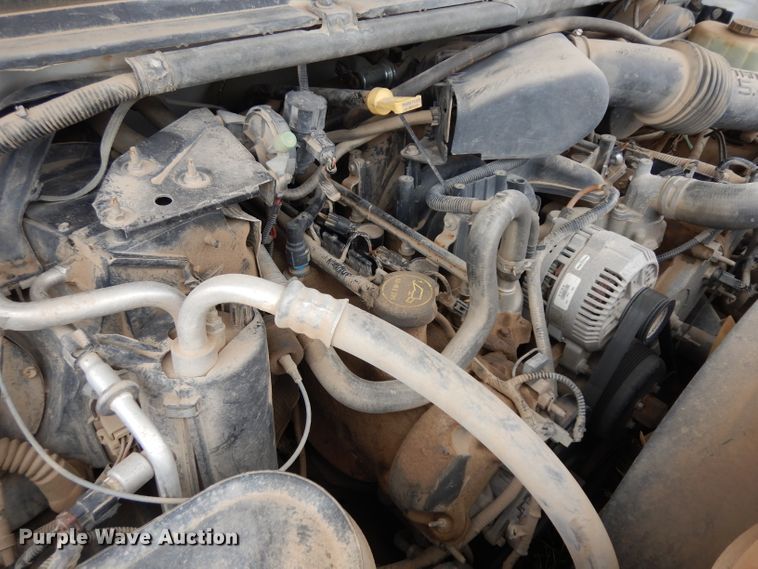 image for item GJ9034 2004 Ford F350 Super Duty Crew Cab utility bed pickup truck