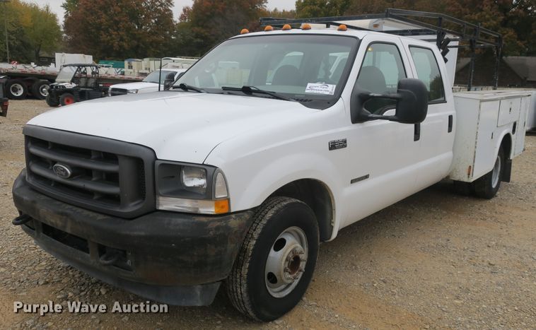 image for item DB10127 2002 Ford F350 Super Duty Crew Cab utility bed pickup truck