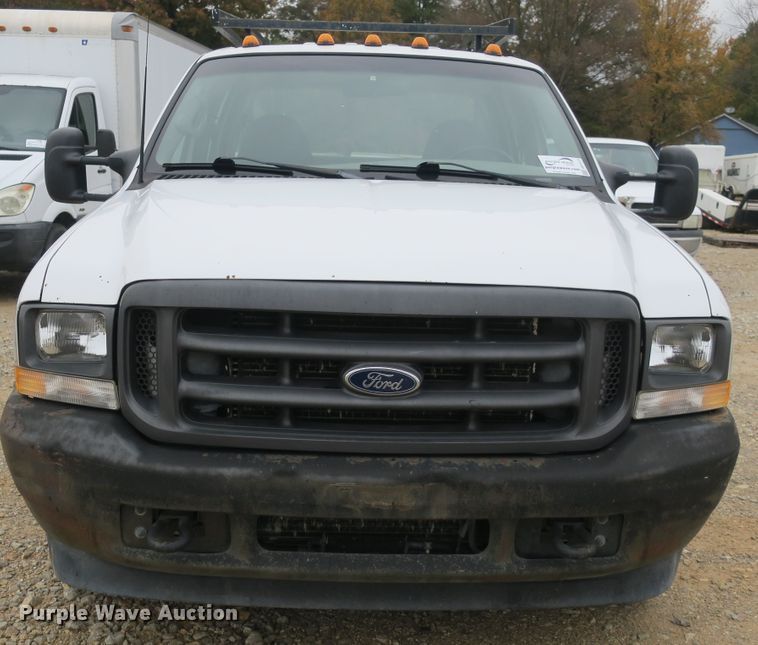 image for item DB10127 2002 Ford F350 Super Duty Crew Cab utility bed pickup truck