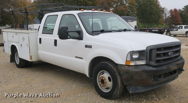 image for item DB10127 2002 Ford F350 Super Duty Crew Cab utility bed pickup truck