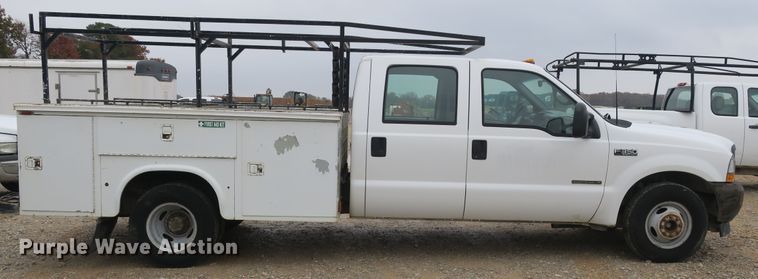 image for item DB10127 2002 Ford F350 Super Duty Crew Cab utility bed pickup truck