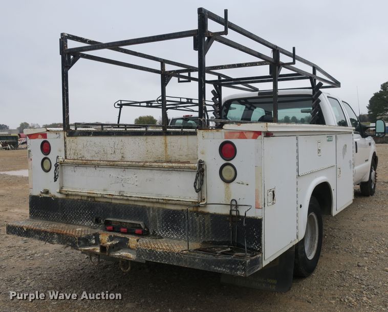 image for item DB10127 2002 Ford F350 Super Duty Crew Cab utility bed pickup truck