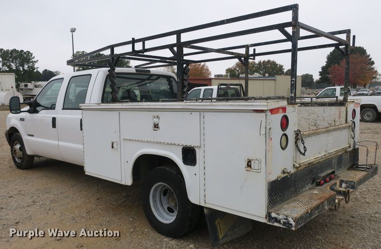 image for item DB10127 2002 Ford F350 Super Duty Crew Cab utility bed pickup truck