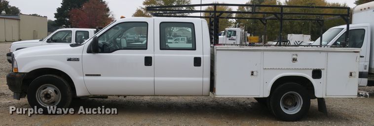 image for item DB10127 2002 Ford F350 Super Duty Crew Cab utility bed pickup truck