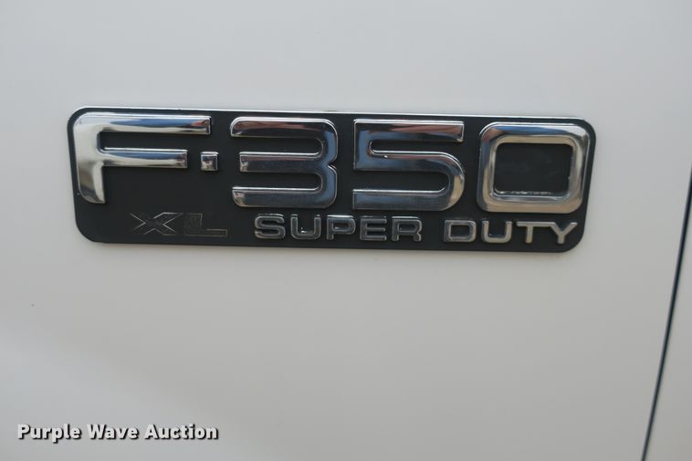 image for item DB10127 2002 Ford F350 Super Duty Crew Cab utility bed pickup truck