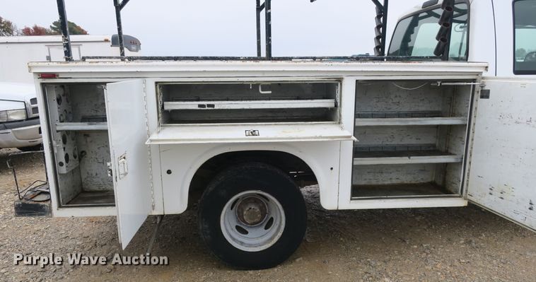 image for item DB10127 2002 Ford F350 Super Duty Crew Cab utility bed pickup truck