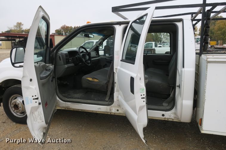 image for item DB10127 2002 Ford F350 Super Duty Crew Cab utility bed pickup truck