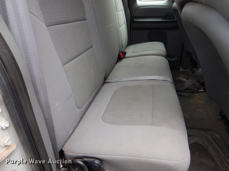 image for item DD4553 2005 Ford F350 Super Duty XLT SuperCab flatbed pickup truck