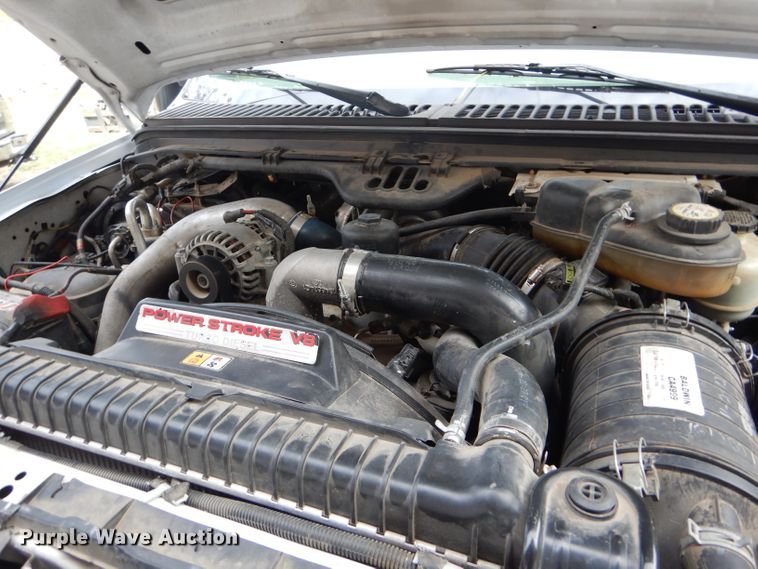 image for item DD4553 2005 Ford F350 Super Duty XLT SuperCab flatbed pickup truck