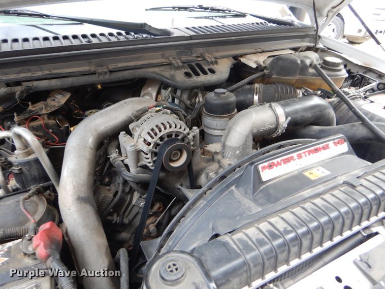 image for item DD4553 2005 Ford F350 Super Duty XLT SuperCab flatbed pickup truck