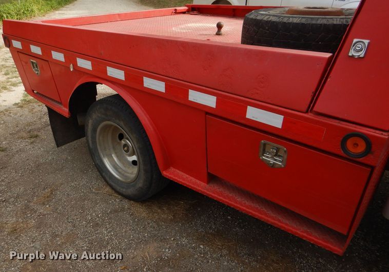 image for item DD4553 2005 Ford F350 Super Duty XLT SuperCab flatbed pickup truck