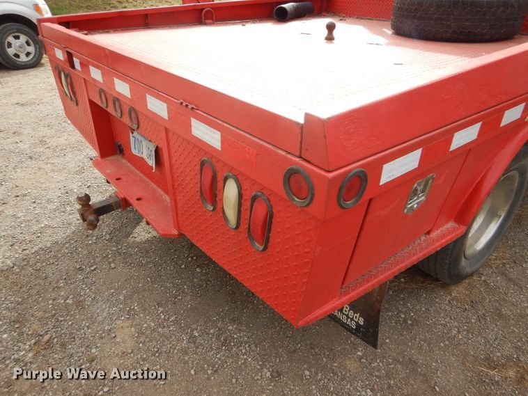 image for item DD4553 2005 Ford F350 Super Duty XLT SuperCab flatbed pickup truck