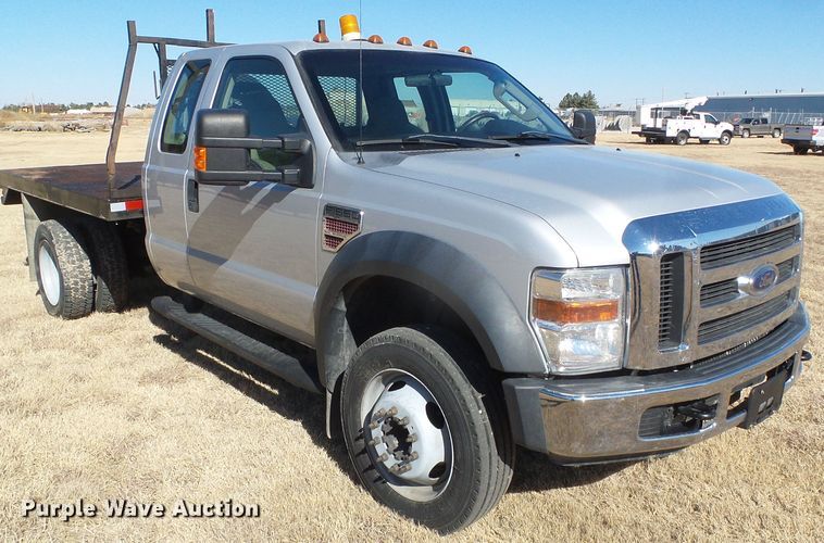 image for item DG0369 2008 Ford F550 Super Duty XLT SuperCab flatbed truck