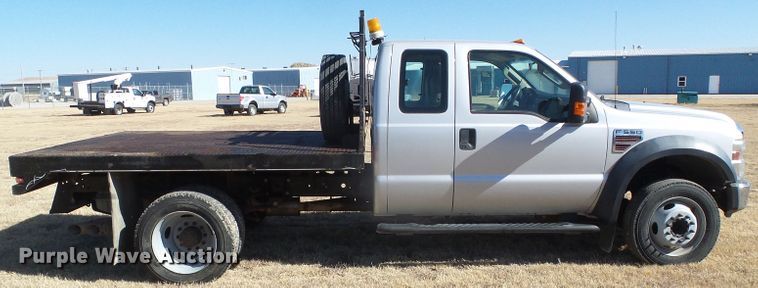 image for item DG0369 2008 Ford F550 Super Duty XLT SuperCab flatbed truck