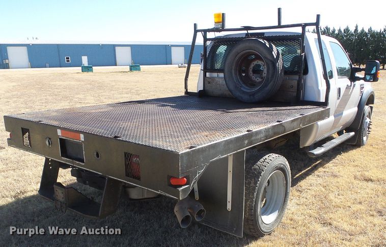 image for item DG0369 2008 Ford F550 Super Duty XLT SuperCab flatbed truck